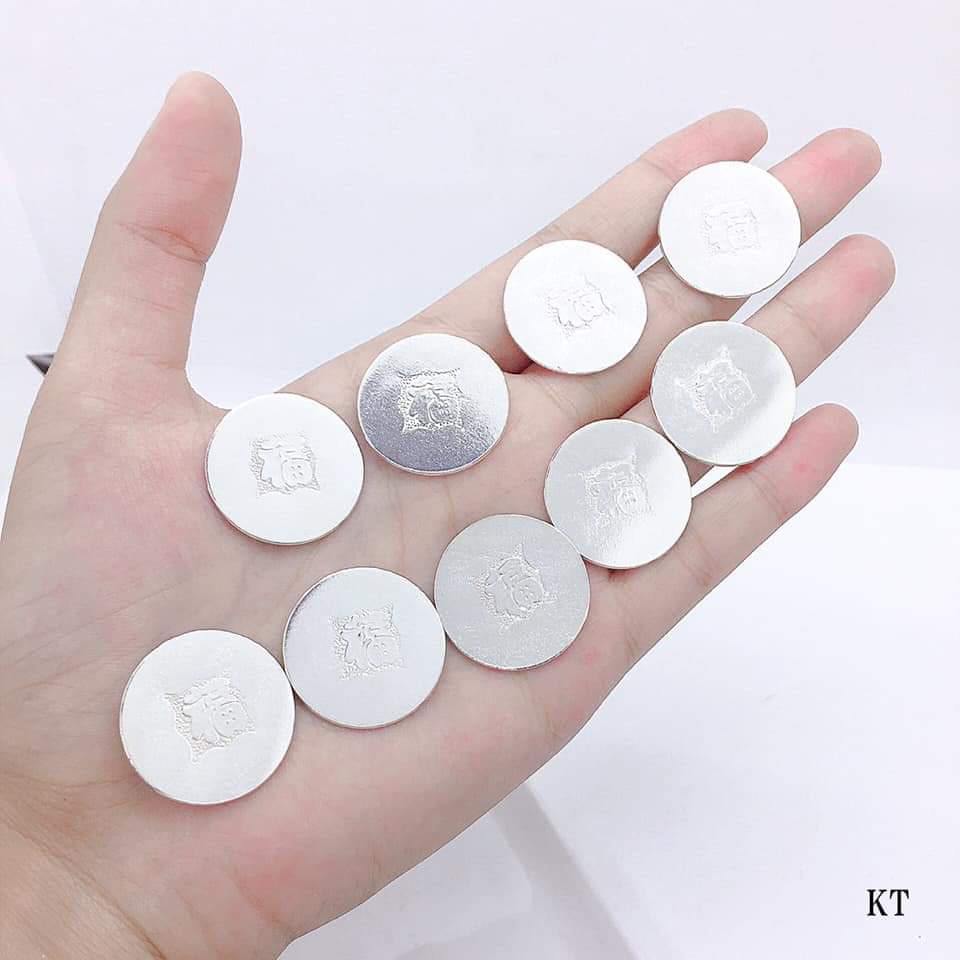Đồng xu bạc cạo gió