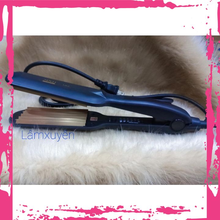 Máy bấm tóc MNH-102 bấm tóc xù đẹp,mềm bóng đẹp với chất liệu thép titan giúp Máy bấm êm, nhanh, không rít tóc