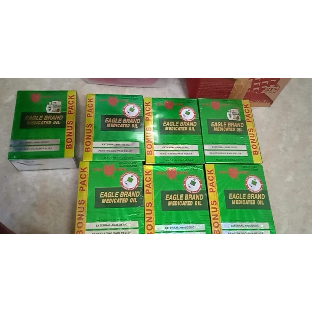Dầu Gió Nước Xanh - Vàng Con Ó 2 Nắp Eagle Brand 24ml
