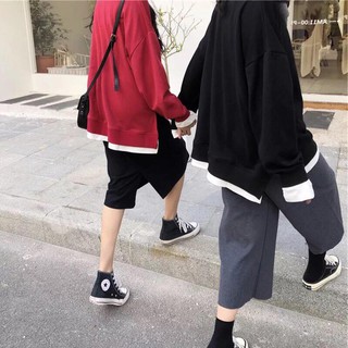 Sweater phối vạt trắng xẻ tà