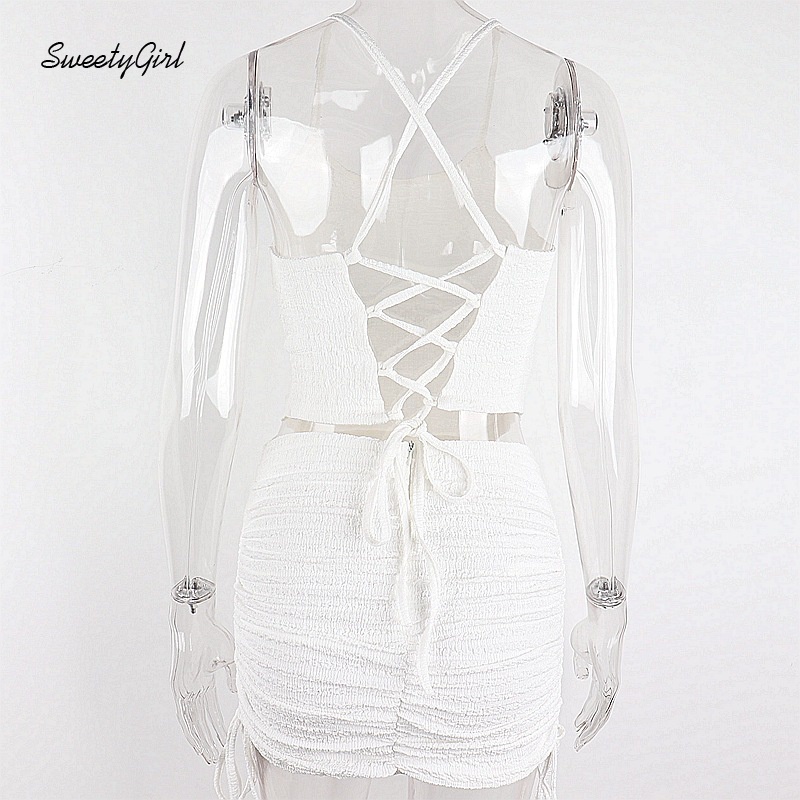 Set áo croptop hở lưng + chân váy ngắn lưng cao màu trơn phối dây rút phong cách gợi cảm cho nữ