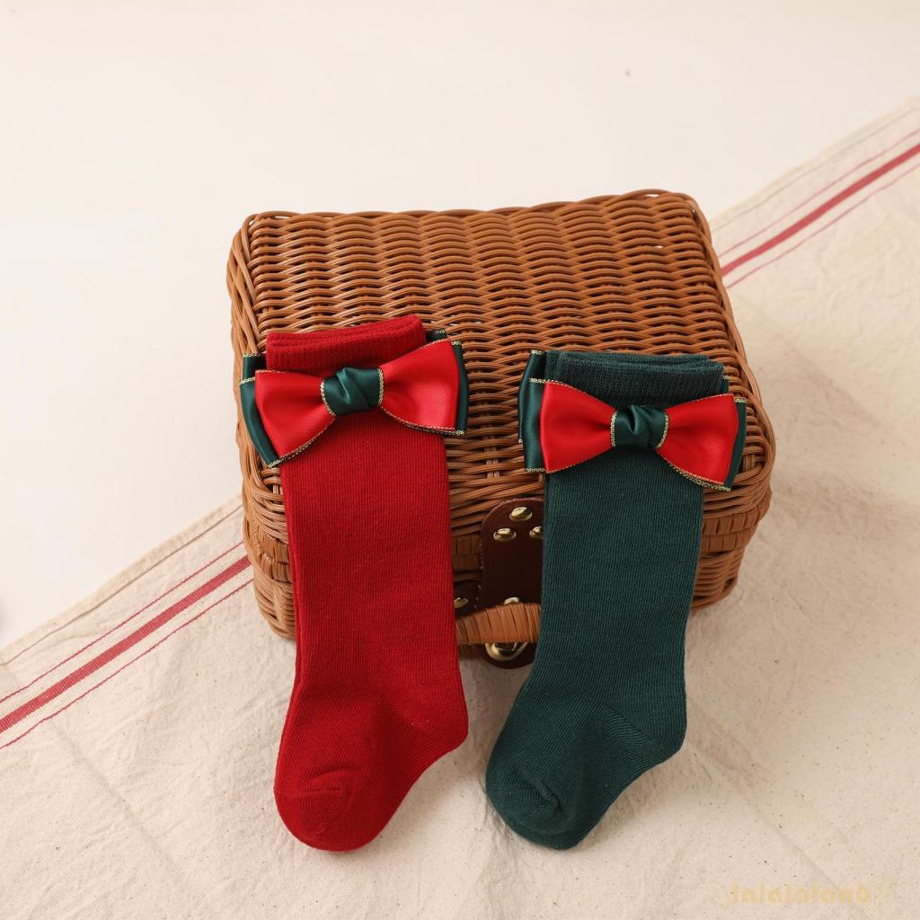 Set 2 đôi vớ dài trung bình đính nơ trang trí Giáng Sinh cho bé