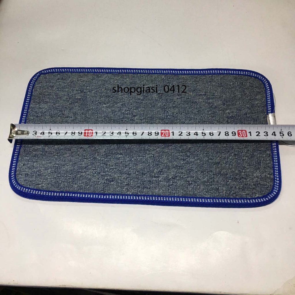 Thảm chống xe máy