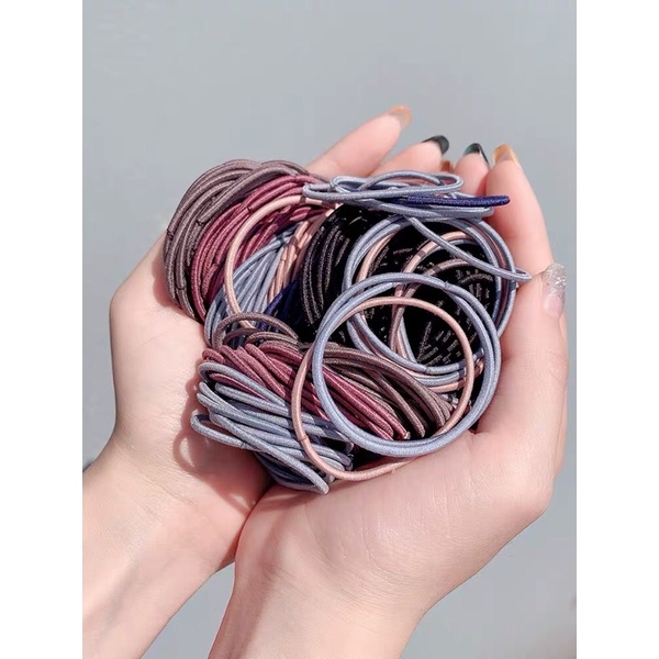 COMBO  100 chun buộc tóc kèm túi Zip - thun cột tóc trơn nhiều màu cho bạn gái