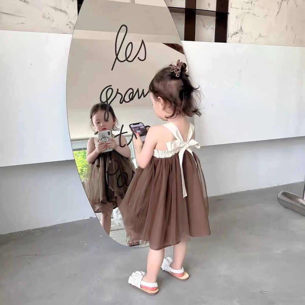 Đầm Công Chúa Hai Dây Phối Lưới Đính Nơ Phong Cách Hàn Quốc Cho Bé Gái