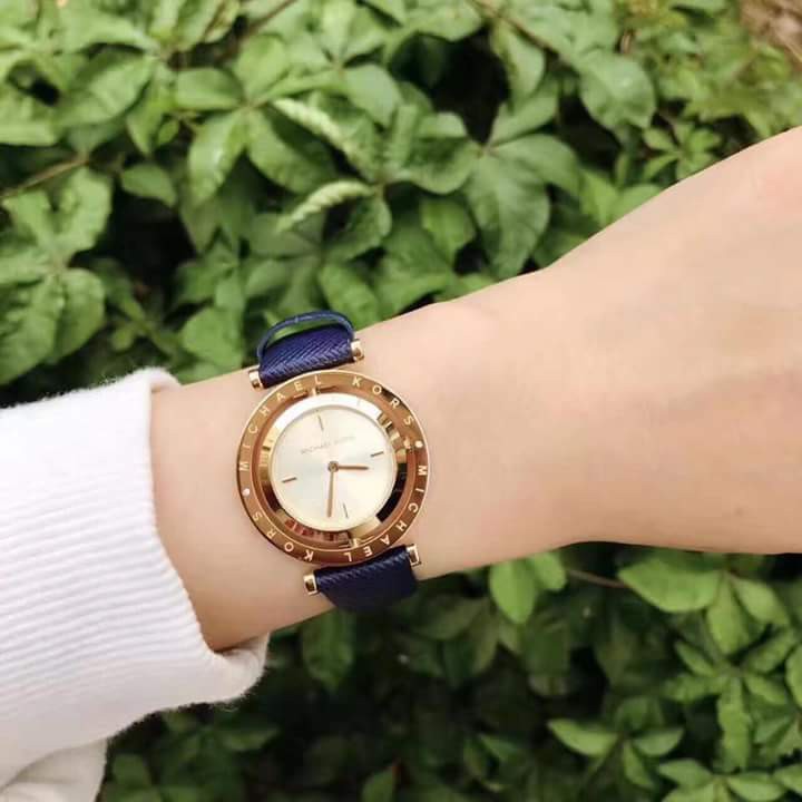 Michael kors dây da mặt xoay