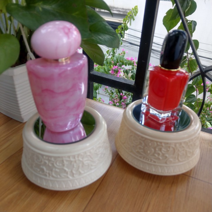 Đế xoay có led dây cót xoay phát nhạc - DX010