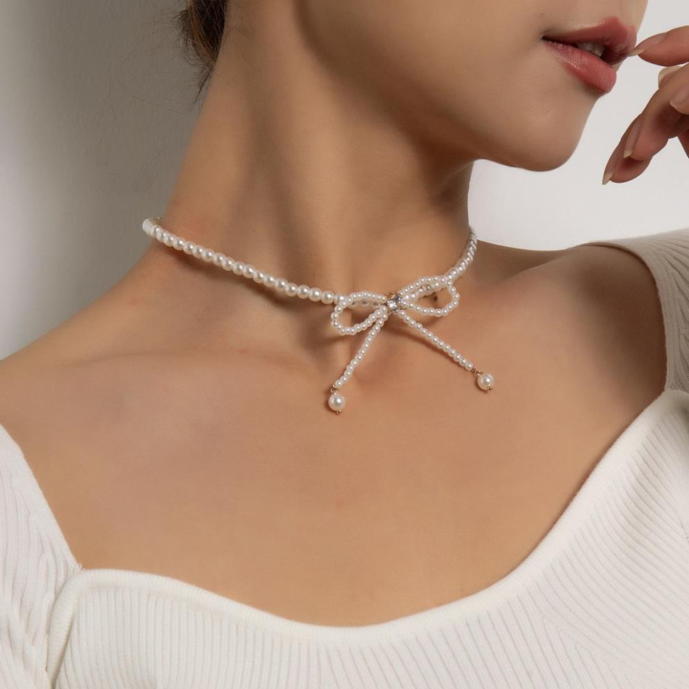 (038) Vòng Cổ Choker Ngọc Nhỏ Thắt Nơ Nữ Tính Thanh Lịch Hàn Quốc