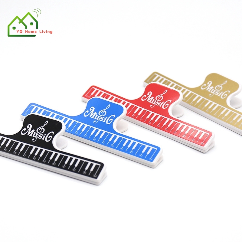 Kẹp nhựa ABS trang trí chữ music gồm 4 màu sắc tùy chọn