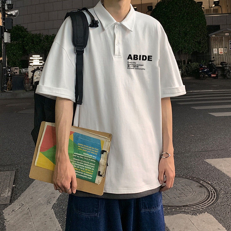 Áo Polo Nam Nữ Form Rộng Chất Thun Mềm Mát Phong Cách In Chữ Cái Cool Hợp Thời Trang Bắt Kịp Xu Hướng TTQ0333