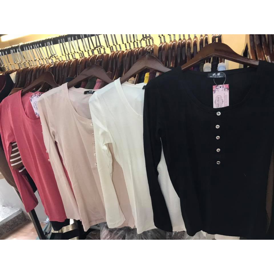 Áo thun gân dài tay cổ tròn có hàng cúc