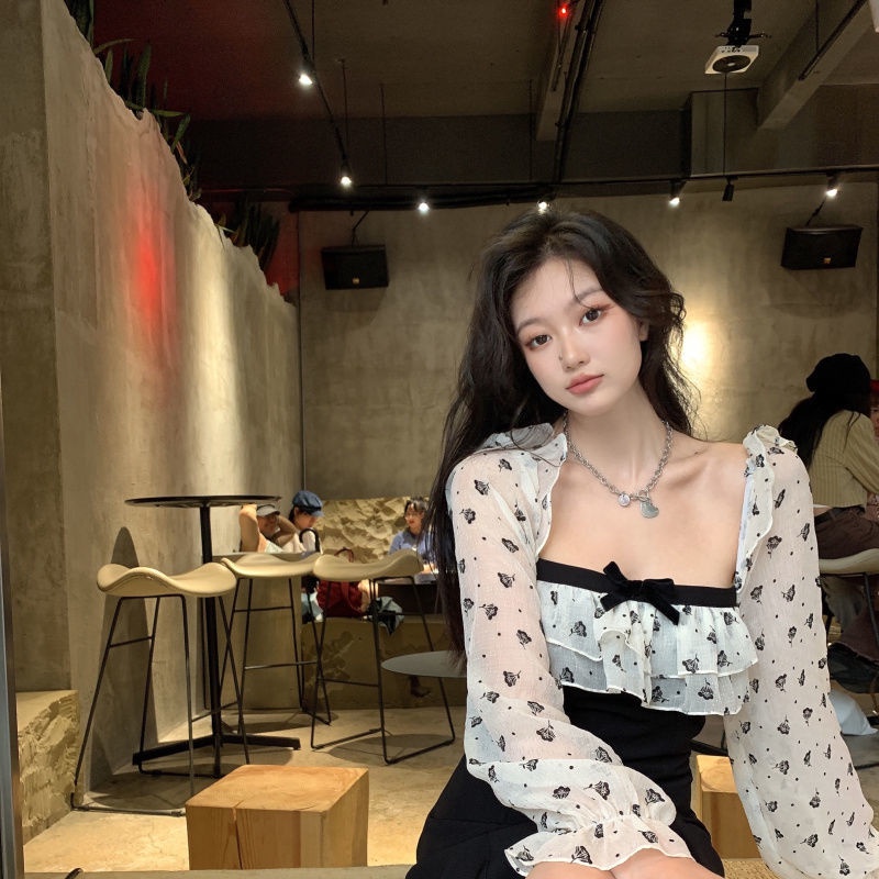 Đầm đen tay dài phối bèo nhún đính nơ phong cách Pháp thời trang mùa thu mới 2021