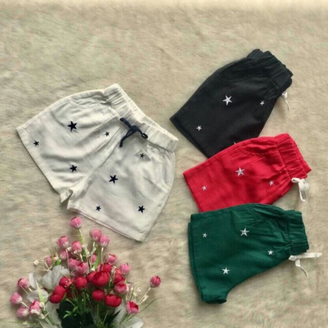 Quần kaki bg hình thêu rơi ngôi sao