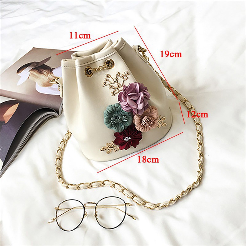 Túi đeo chéo hoạ tiết hoa trà