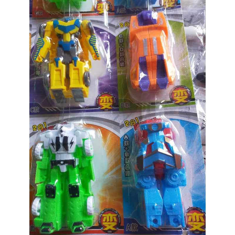 Vỉ 16 con xe đồ chơi siêu nhân biến hình có 2 loại