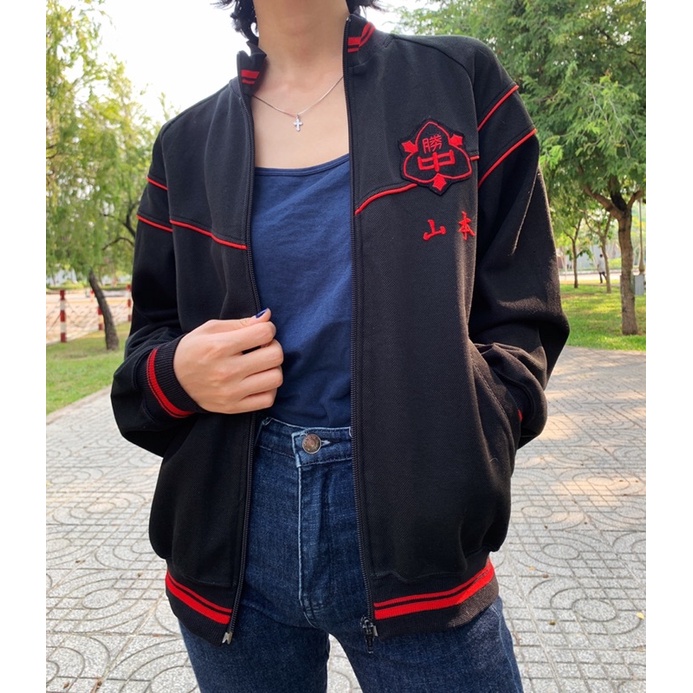 Áo boomber đen phối viền đỏ