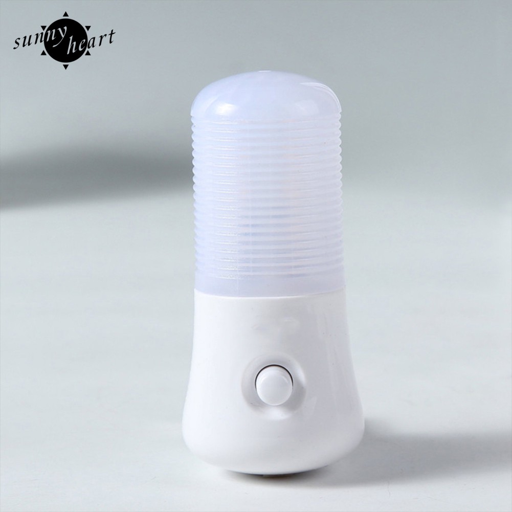 Đèn ngủ led màu trắng ấm 3W đặt cạnh giường ngủ