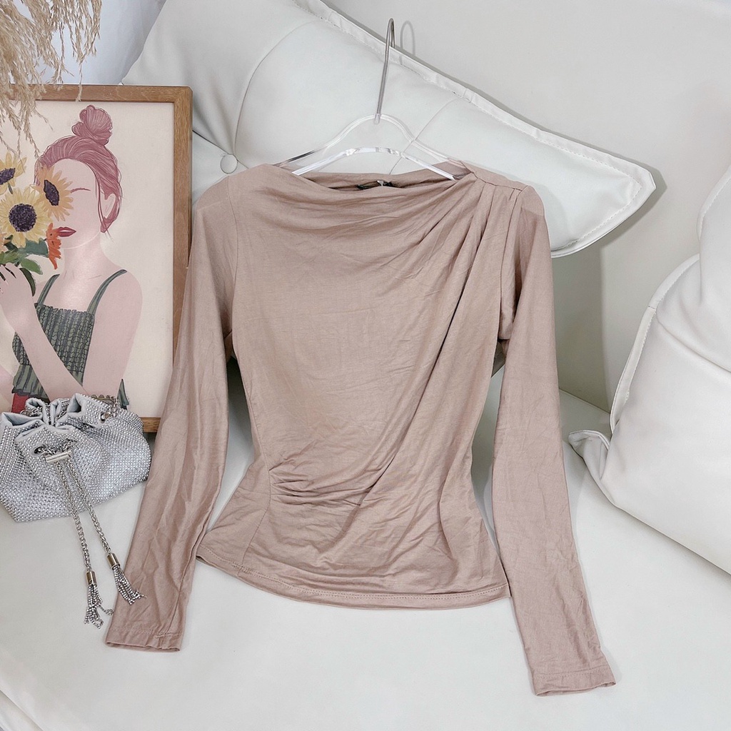 Áo da cá lệch vai