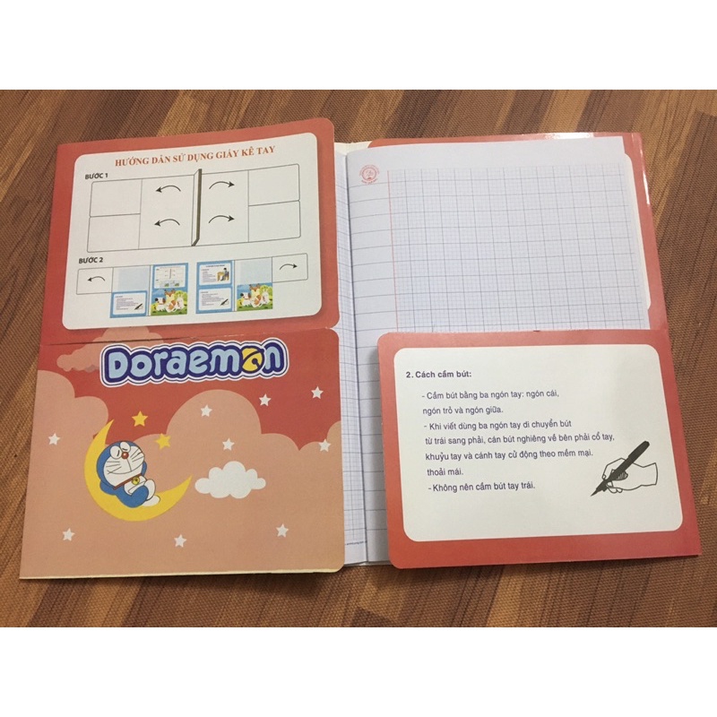 Bìa kê tay giúp vở con luôn sạch đẹp hình Doraemon đáng yêu