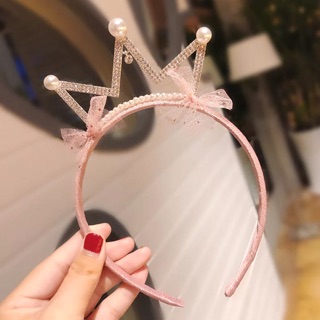 Cài vương miện