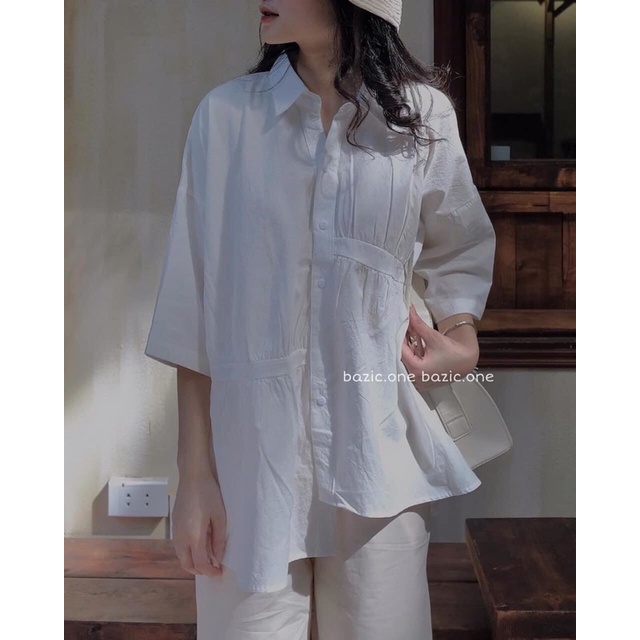 Áo sơ mi vạt lệch form rộng (ảnh shop tự chụp)