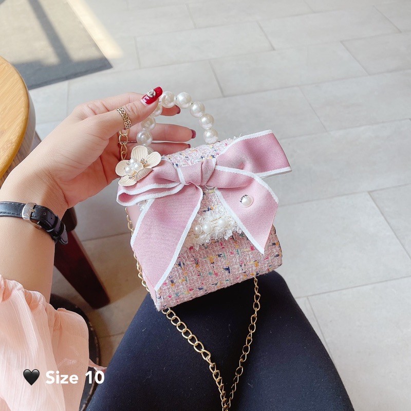 Túi xách tay mini quai ngọc phối nơ dành cho bé phối da dạ dễ thương mùa xuân 2021