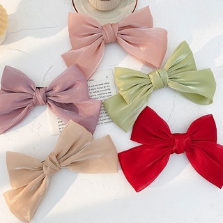 Kẹp tóc đính nơ màu trơn phong cách Hàn Quốc nữ tính xinh xắn