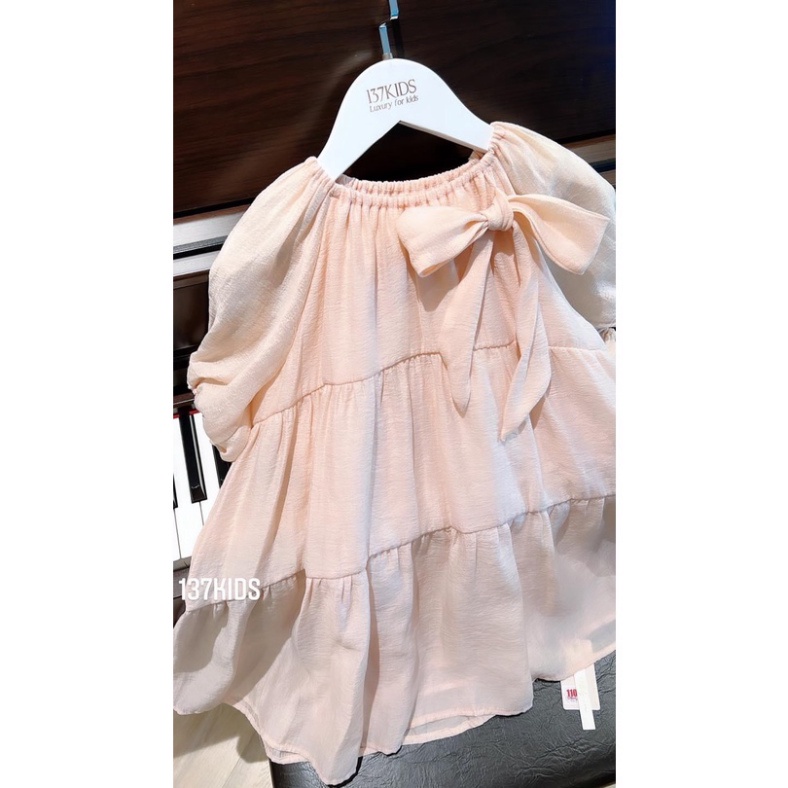 Váy xòe tầng bé gái kiểu dáng công chúa, Váy công chúa màu kem cổ chun gắn nơ ngực xinh xắn bé gái