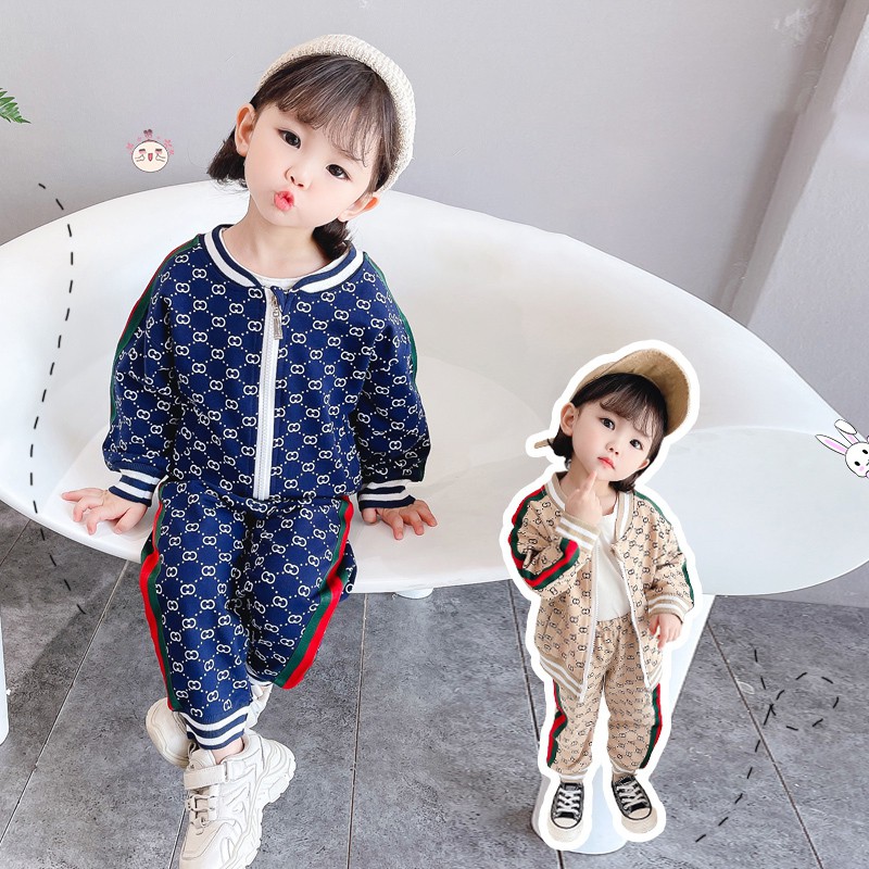 Set đồ 2 món áo khoác khóa kéo in họa tiết kèm quần dài thời trang cho bé