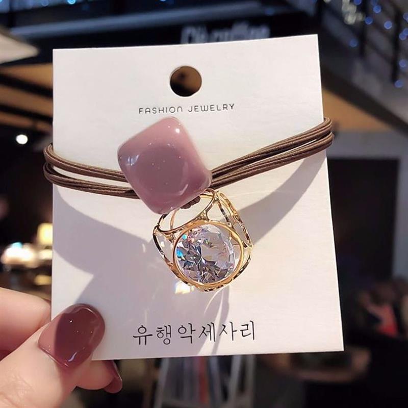 1 dây buộc tóc co giãn có giá đỡ cho nữ