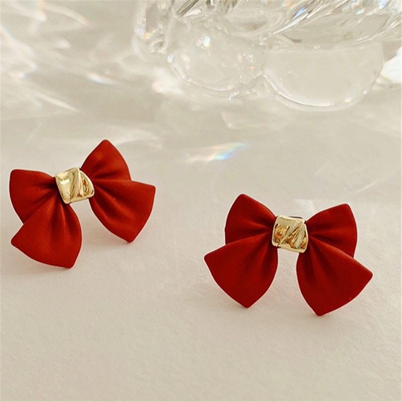 Đôi khuyên tai chốt bạc 925 họa tiết chiếc nơ xinh xắn cho nữ