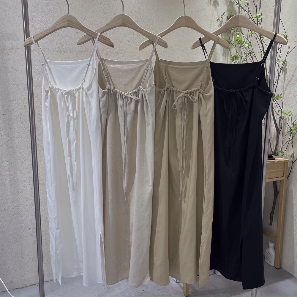 Đầm/Váy 2 dây đũi xẻ tà hở lưng cột nơ sau phong cách Ulzzang
