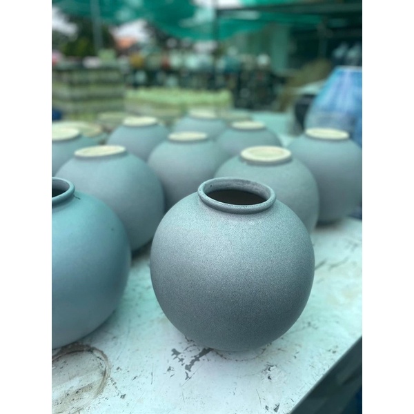 Bình gốm xuất dư