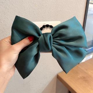 Kẹp tóc phối họa tiết nơ dễ thương cho nữ