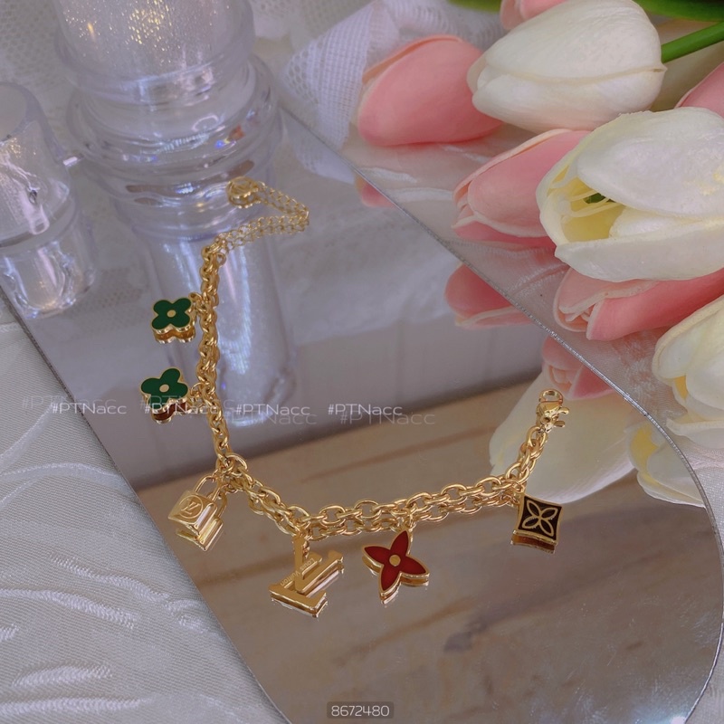 Lắc tay titan charm tòn ten logo thương hiệu cỏ 4 lá nhiều màu dễ thương .PTNACC.