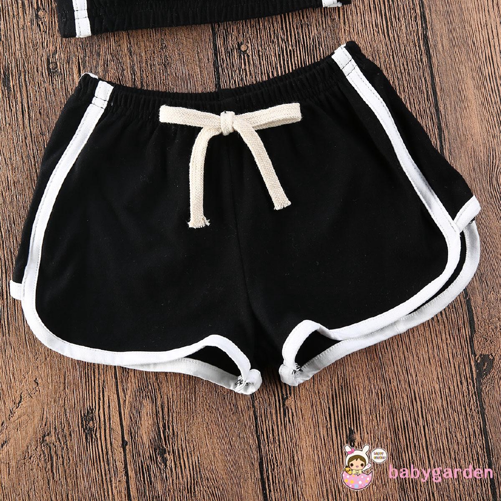 Set áo croptop hai dây + quần đùi màu trơn thể thao thời trang cho bé gái