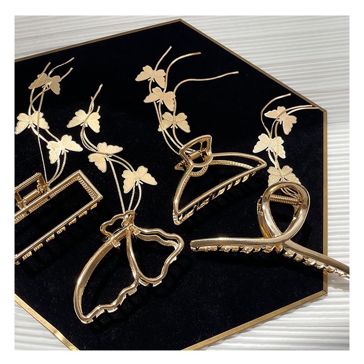 Kẹp tóc bằng kim loại hình bướm đính pha lê sang trọng