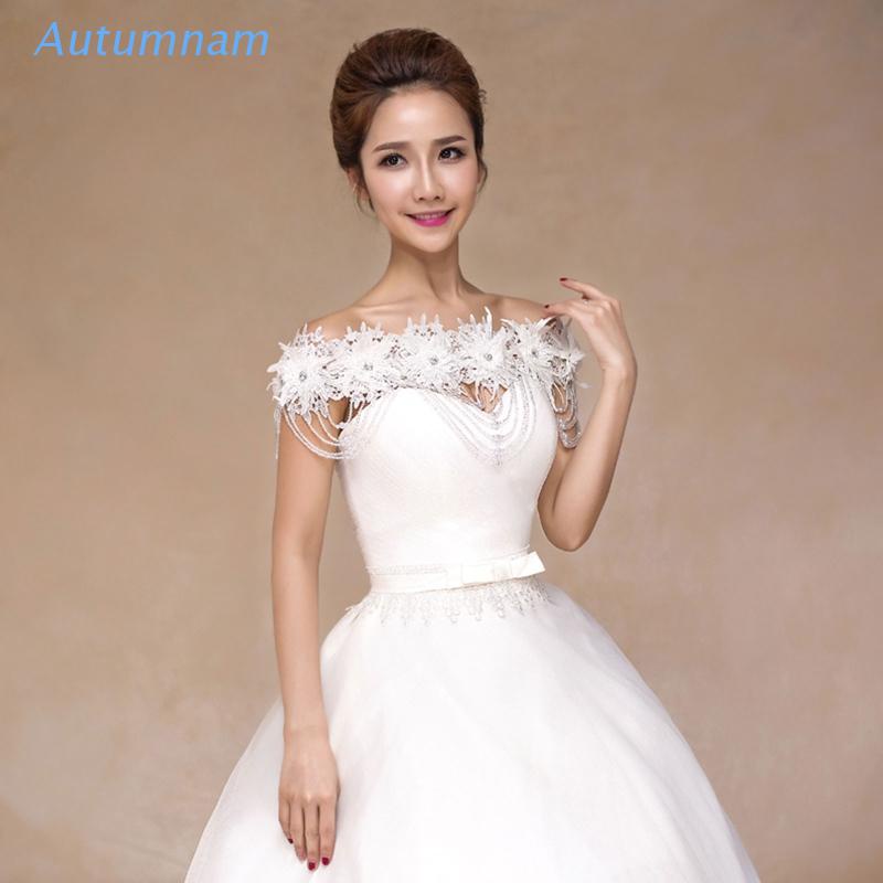 Áo choàng vai đính ngọc trai phối tua rua thời trang cho nữ