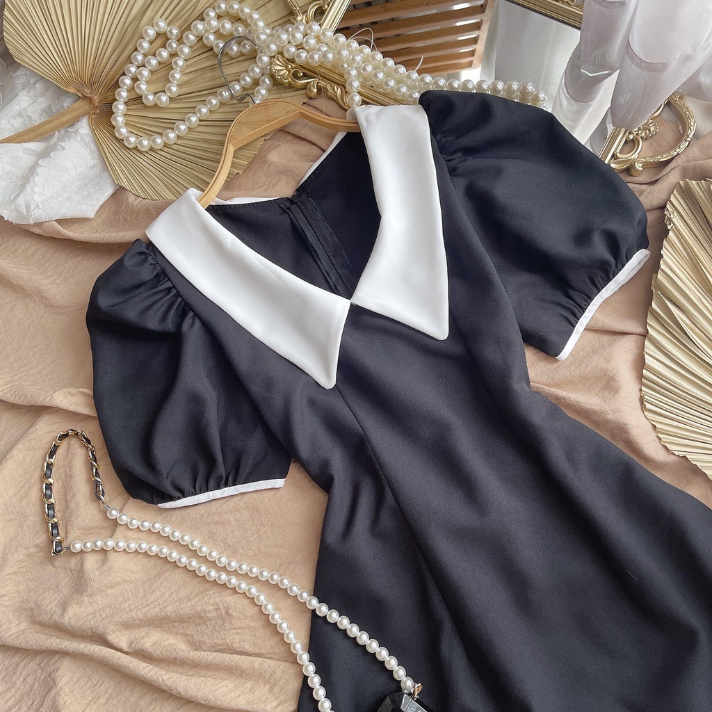 ĐẦM MIDI ĐEN TAY BỒNG CỒ NHỌN TRẮNG | BigBuy360 - bigbuy360.vn