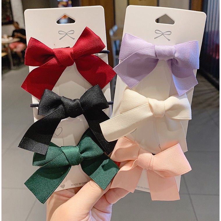 Kẹp tóc đính nơ phong cách ngọt ngào đáng yêu cho nữ