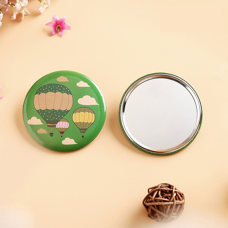 Gương trang điểm mini hình tròn in hoạt hình đáng yêu