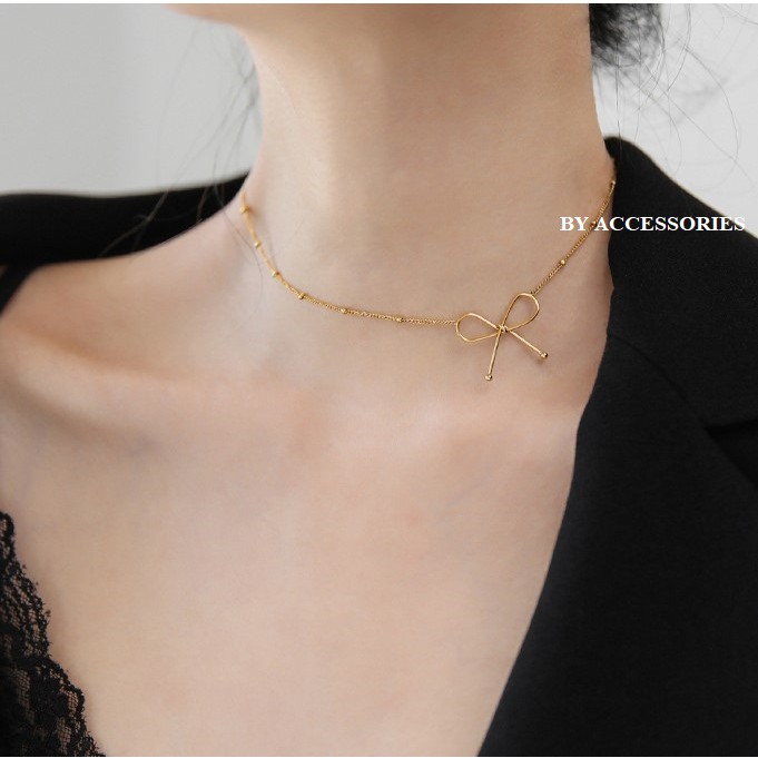 Choker titan xích bi phối mặt nút thắt nơ không gỉ