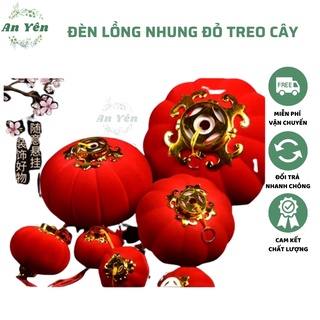 Đèn lồng nhung đỏ treo cây cảnh