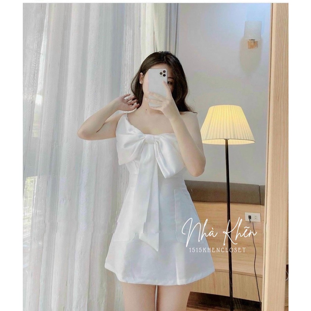 Đầm 2 dây mini trắng nơ ngực to