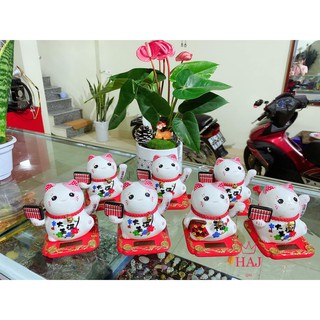 Tượng mèo thần tài vẫy cửa