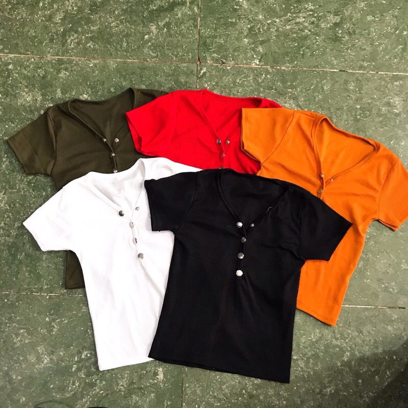 Áo tay con nút cổ