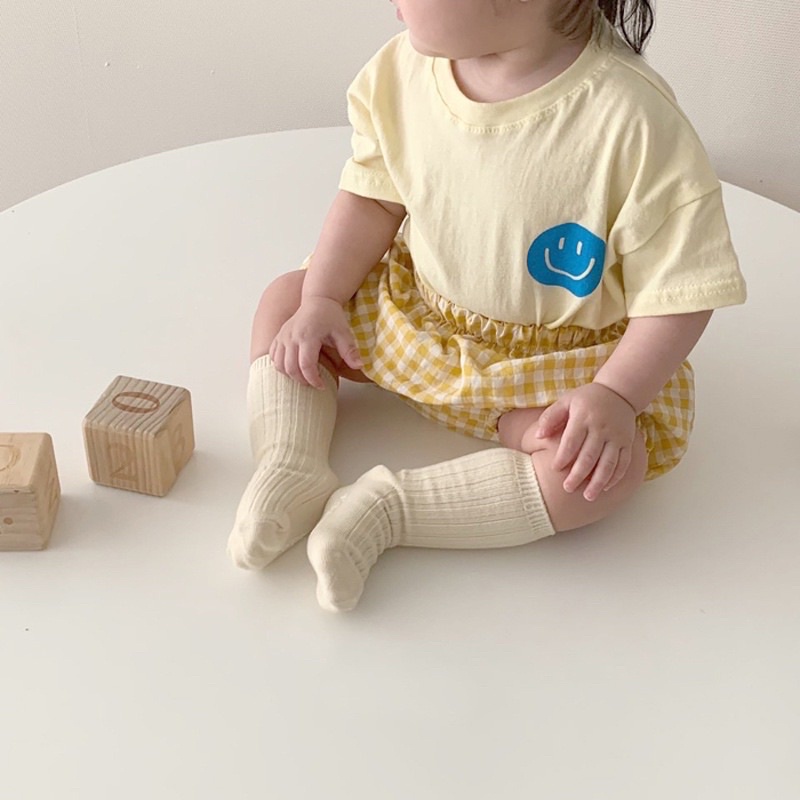 set áo in hình mặt cười kèm quần short caro cho bé