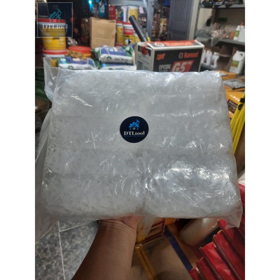 Túi 1Kg ~ 6000 cái ke chữ thập, ke cộng loại 1.5mm. Lấy vuông góc gạch khi thi công ốp lát