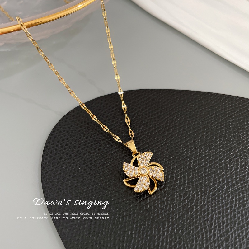 Vòng cổ bằng thép titan mặt hình cối xay gió nhỏ đính đá có thể xoay được phong cách sang trọng thời trang cho nữ