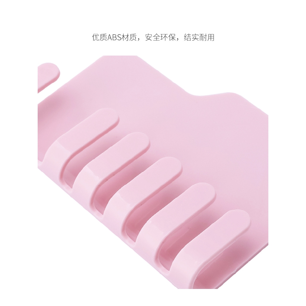 Handy wall mounted toothbrush/toothpaste/razor holder